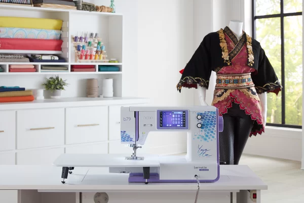 Sewing Machine in creative sewing designer room white purple and maroon colours